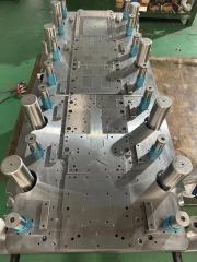 Cruciform lamination high speed carbide die