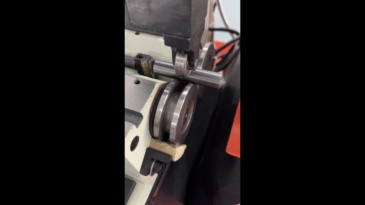 Pressure wheel type automatic outer diameter punch grinder