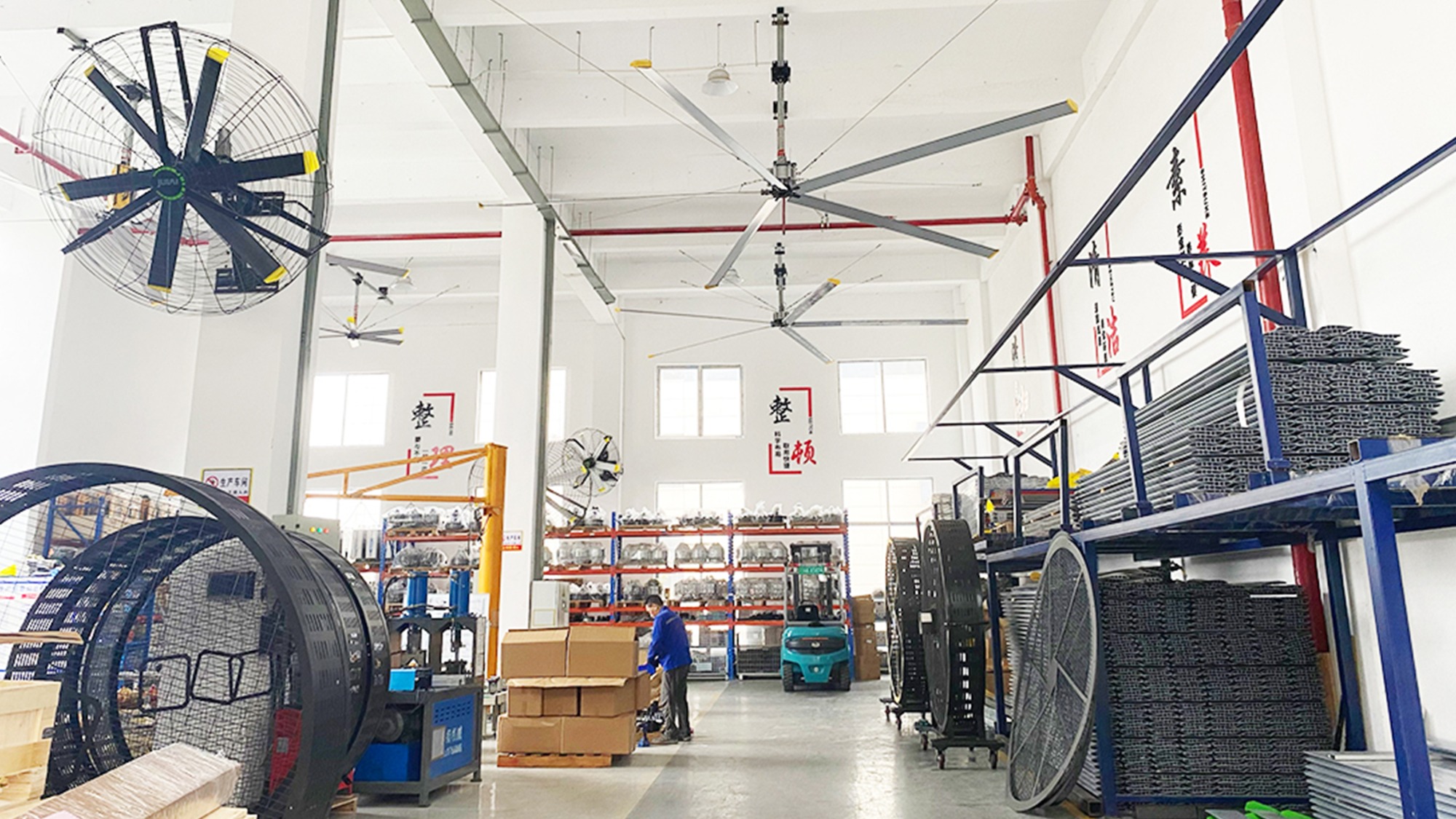 What factors should be considered when selecting a large fan for a factory?