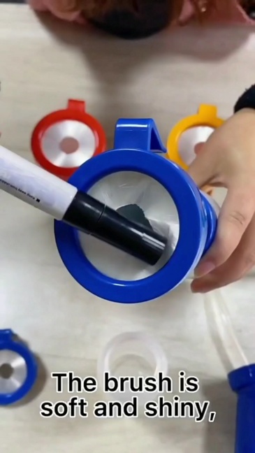 Non-return teat dip cup with brush