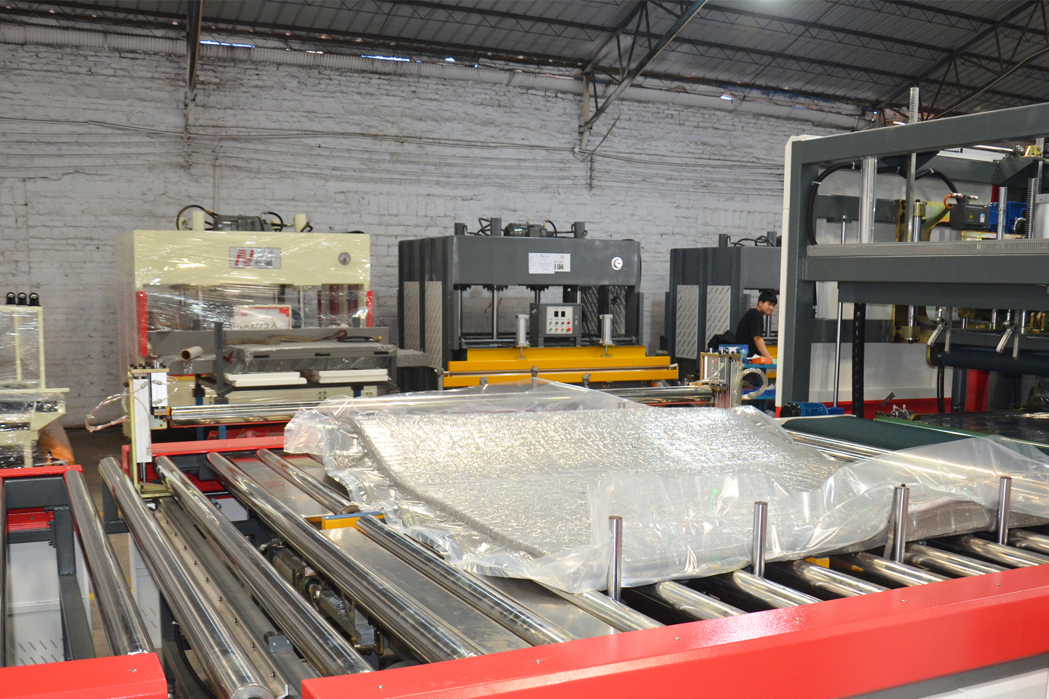 Full Automatic mattress compression fold and roll packaging machine