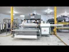 Semi-automatic mattress compression and rolling machine