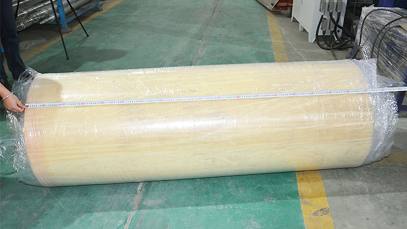 Foam roll-packing machine in operation