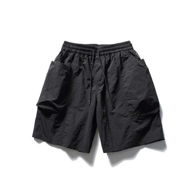 Hot sale summer quick dry big pocket quarter pants trend casual solid color loose beach shorts men,Shuliqi Apparel - Men's Clothing Wholesale Manufacturer,Hot sale summer quick dry big pocket quarter pants trend casual solid color loose beach shorts men | Wholesale Men's Apparel | OEM | Shuliqi