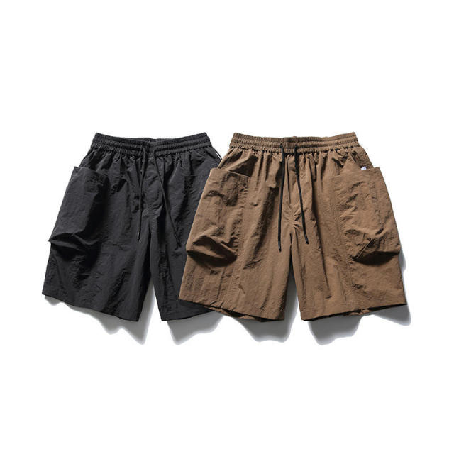 Hot sale summer quick dry big pocket quarter pants trend casual solid color loose beach shorts men,Shuliqi Apparel - Men's Clothing Wholesale Manufacturer,Hot sale summer quick dry big pocket quarter pants trend casual solid color loose beach shorts men | Wholesale Men's Apparel | OEM | Shuliqi