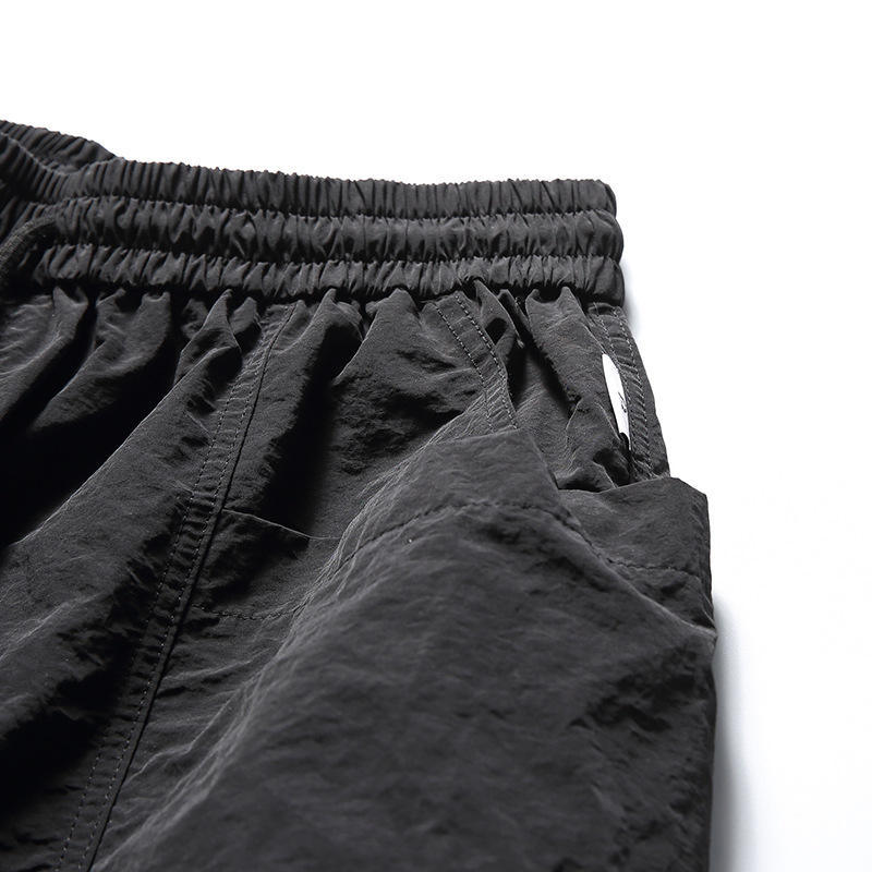 Hot sale summer quick dry big pocket quarter pants trend casual solid color loose beach shorts men,Shuliqi Apparel - Men's Clothing Wholesale Manufacturer,Hot sale summer quick dry big pocket quarter pants trend casual solid color loose beach shorts men | Wholesale Men's Apparel | OEM | Shuliqi