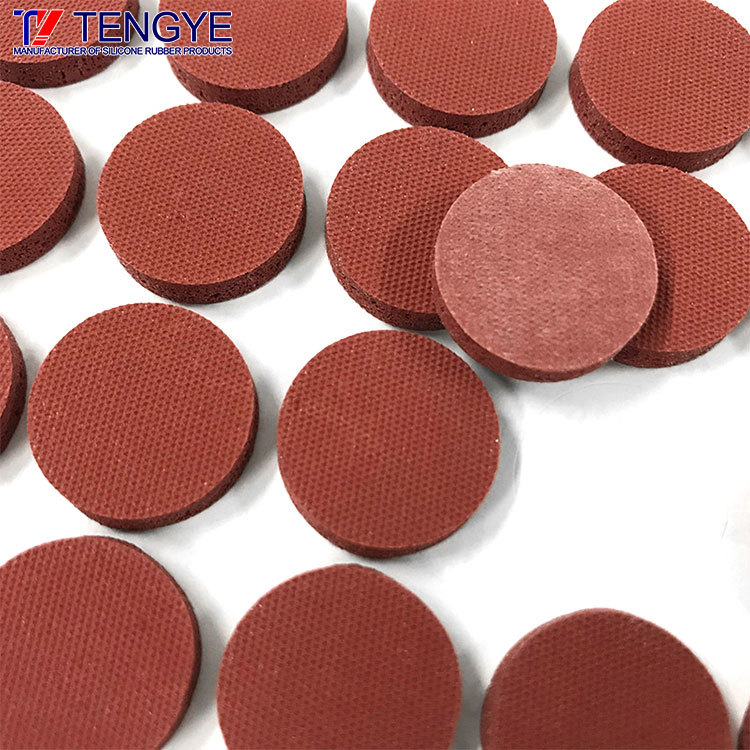 Self-adhesive foamed silicone mat
