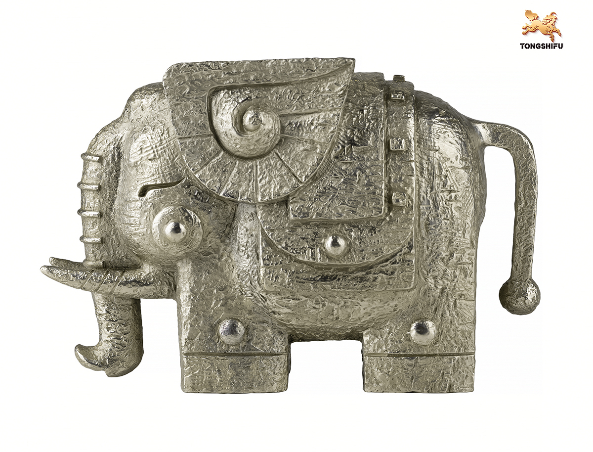 THE ELEPHANT FIGURE
