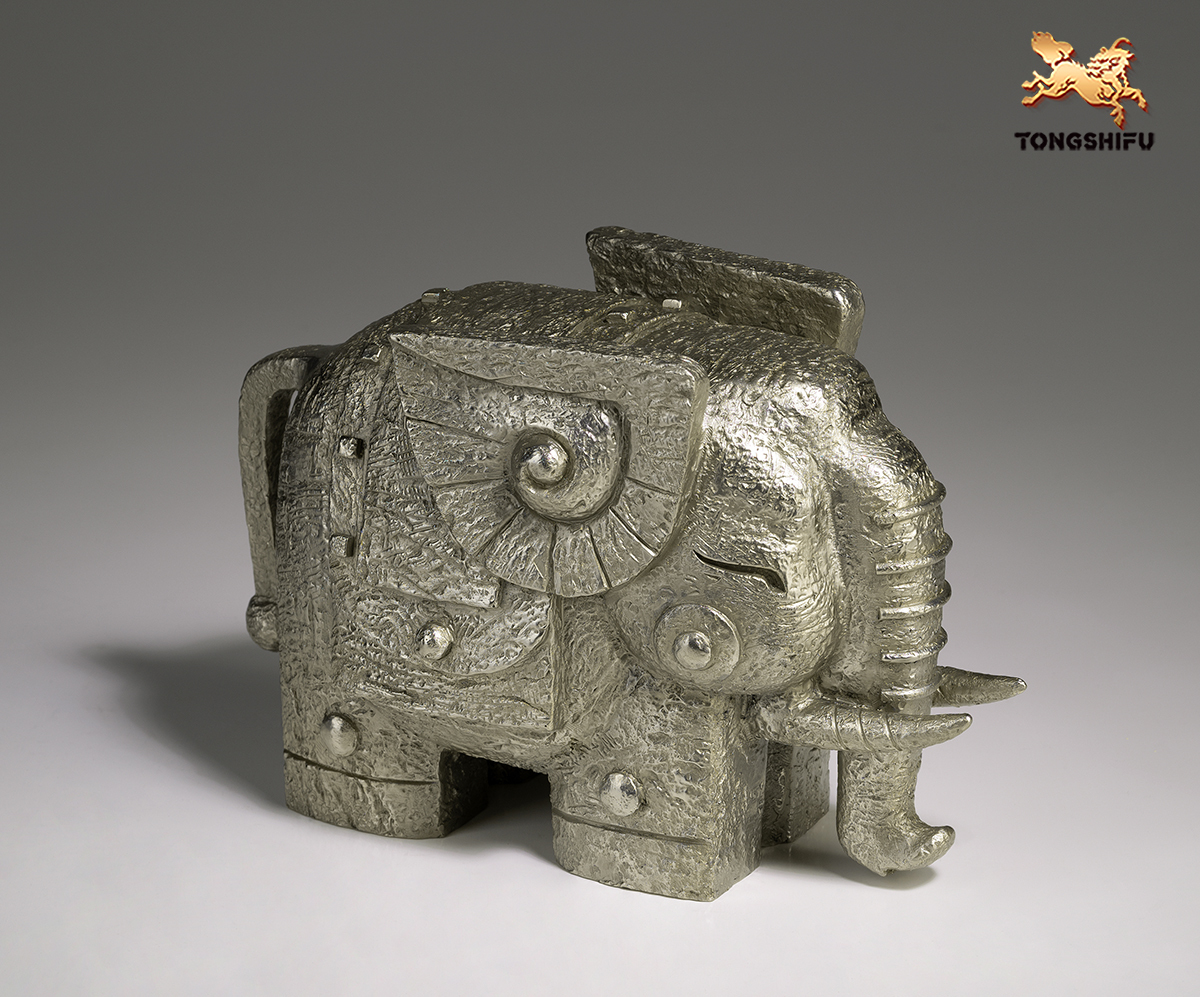 THE ELEPHANT FIGURE
