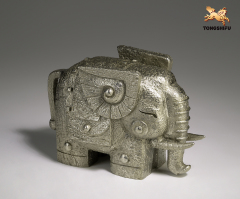 THE ELEPHANT FIGURE