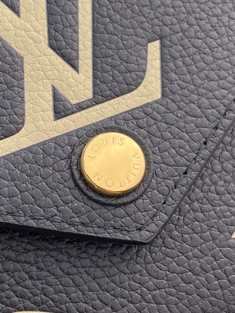 Victorine Victorine Monogram Empreinte Monogram  size 12 x 9.5 x 1.5