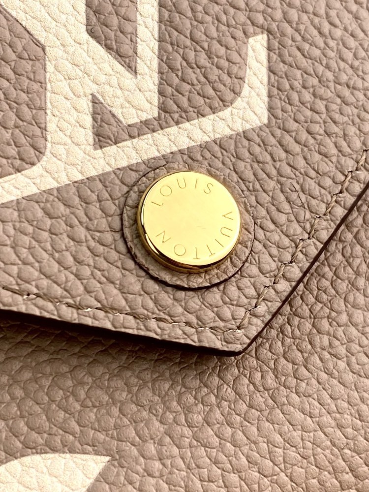Victorine Victorine Monogram Empreinte Monogram  size 12 x 9.5 x 1.5