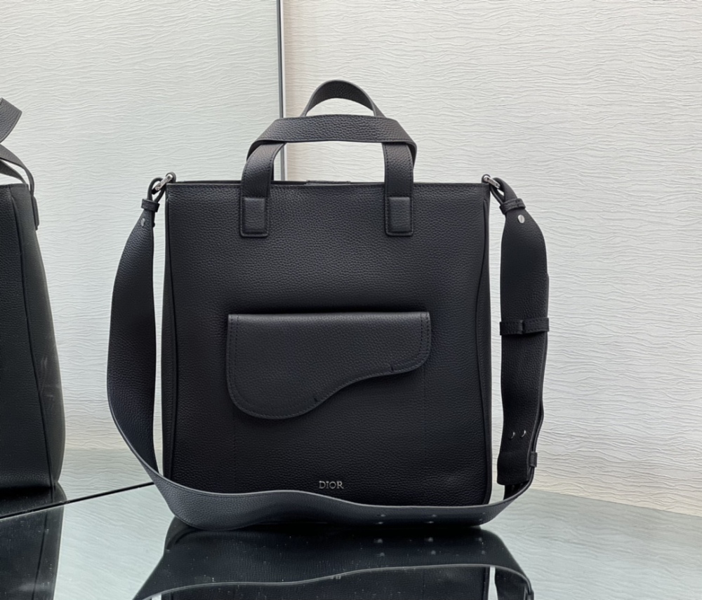 Dior man's Black tote bags