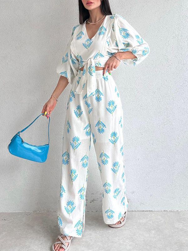 Europe and the United States leisure suit 2023 summer new V-neck temperament printed bubble sleeve top and trousers ladies two-piece set