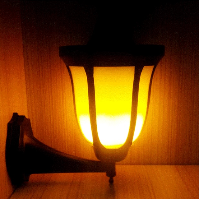 Milalit Flickering Unique 96 LED Solar Torch Light Flame Fire Decorative Wall Mounted Lamp for Yard Fence Garden Pathway Patio Hotel