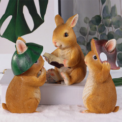 Milalit Resin Brown Wearing Mushroom Watermelon Hat Rabbit Cute Decorative Reading Book Figurine Bunny Handmade Sculpture for Easter Halloween Party Christmas Home Decoration
