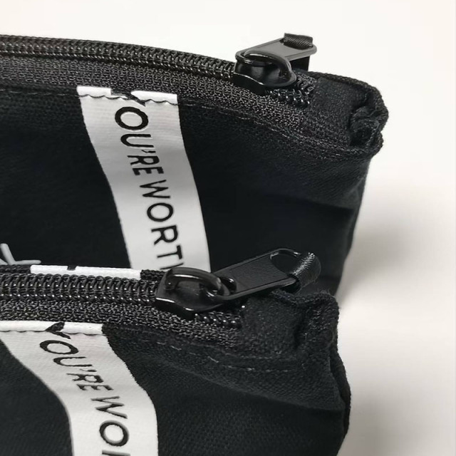 Black canvas makeup bag with zipper