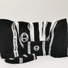 Black canvas makeup bag with zipper