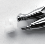 ADHESIVE REMOVING PLIER