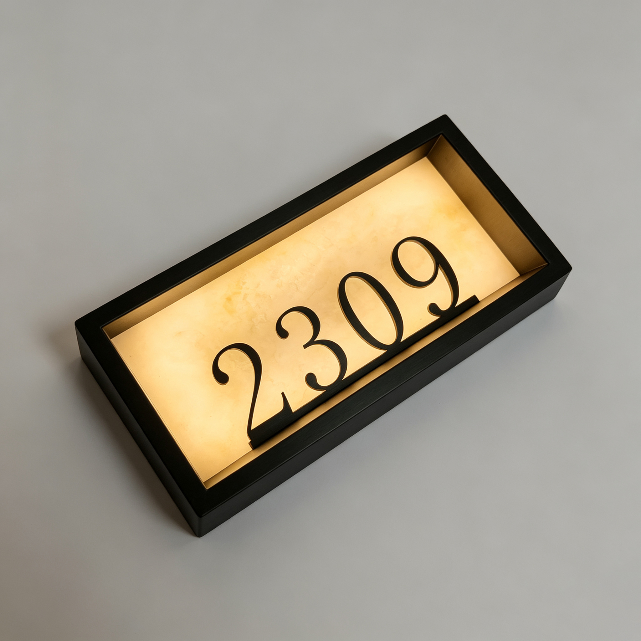 Black Frame Backlit Hotel Room Number Sign