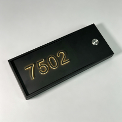 Stainless steel raised Braille hotel room doorplate with smart bell