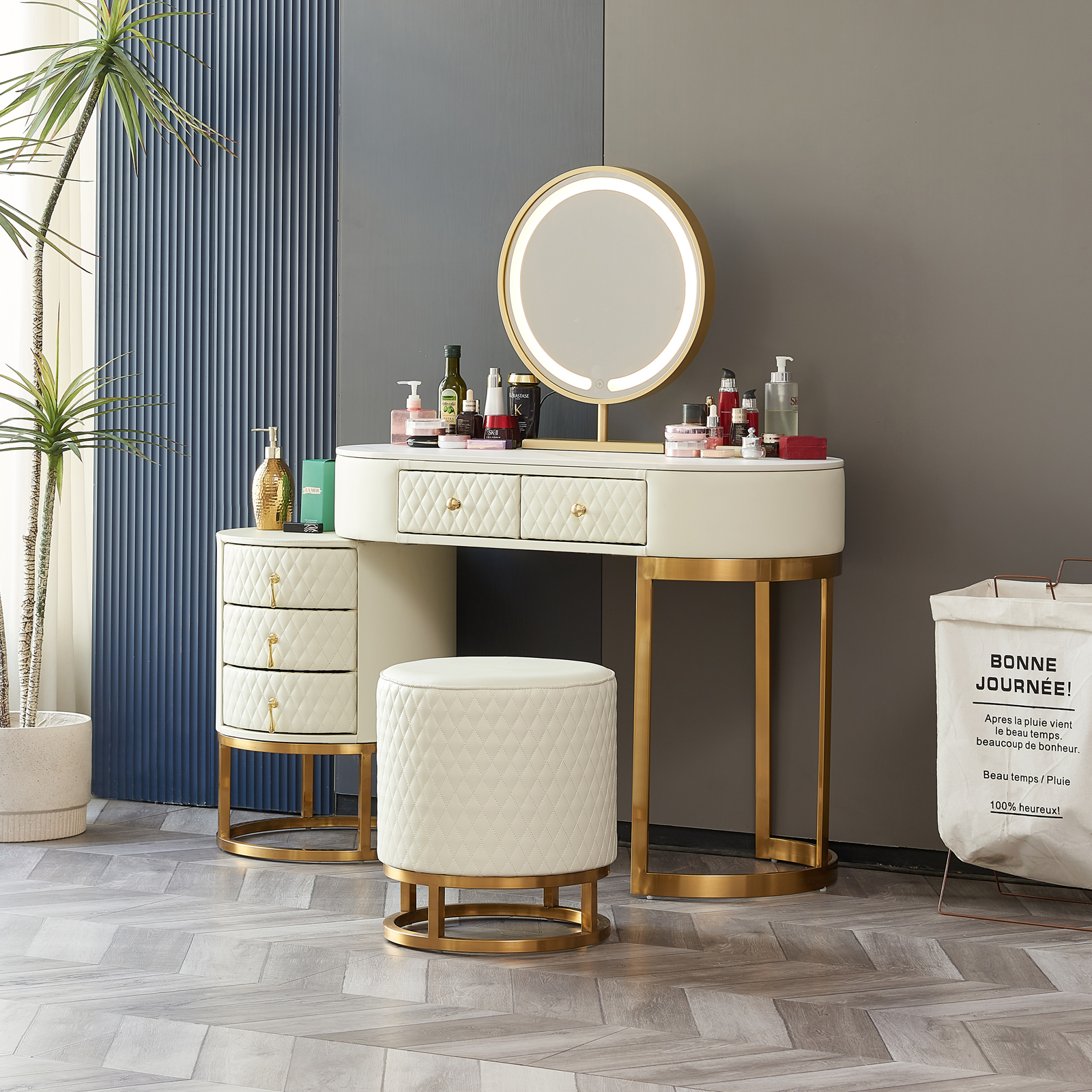 Elegant vanity with large oval mirror and gold accents