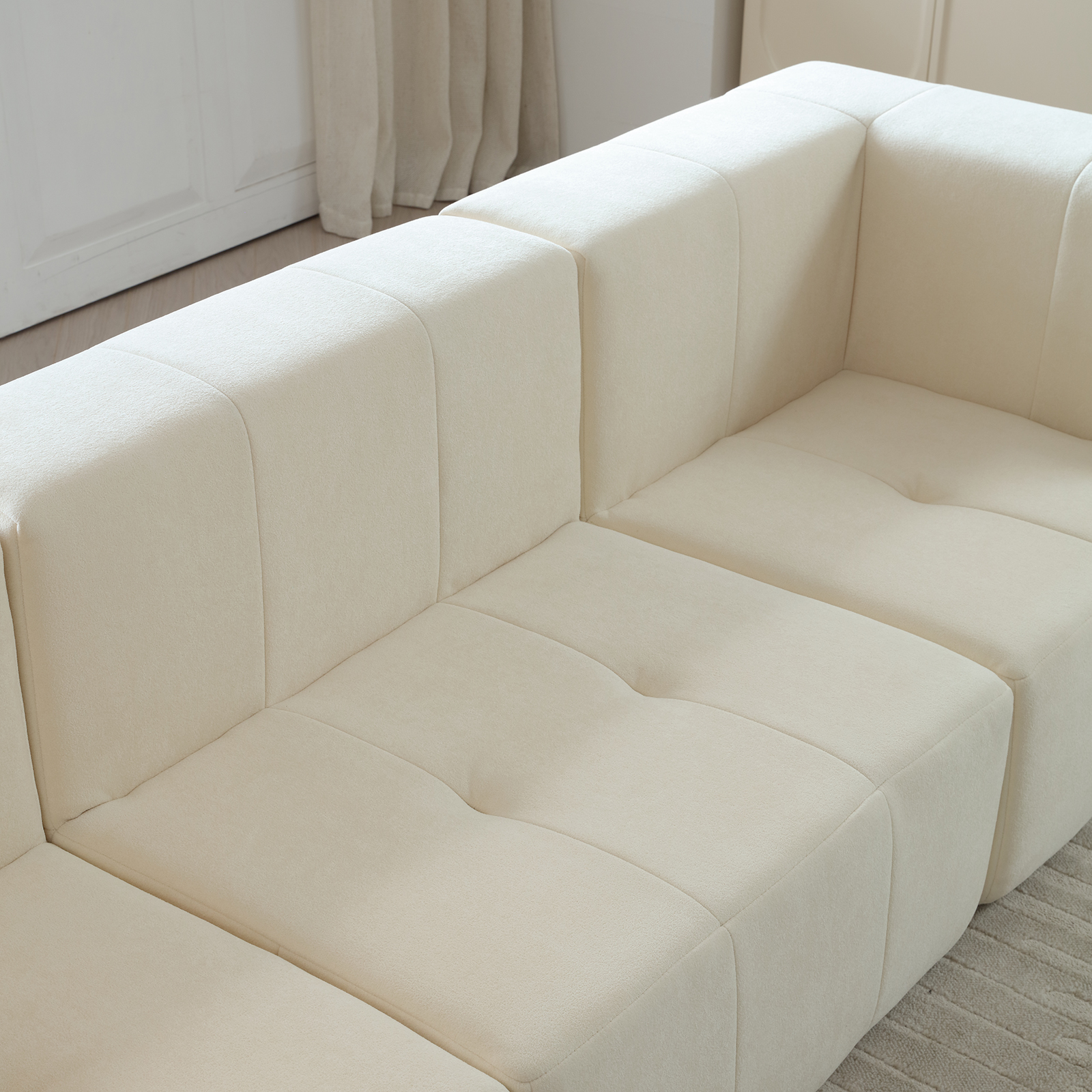 Stylish sectional sofa with beige upholstery adding a touch of class
