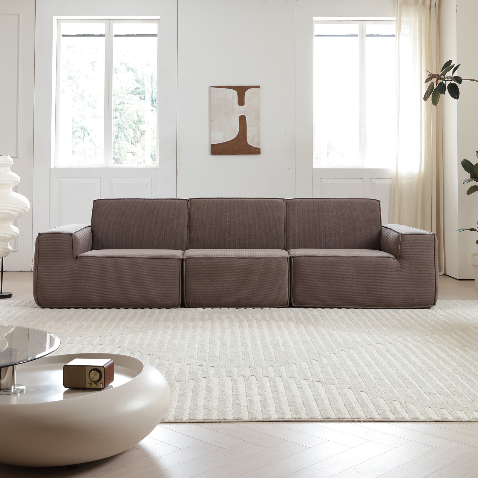 Large sectional grey upholstered sofa in a living room