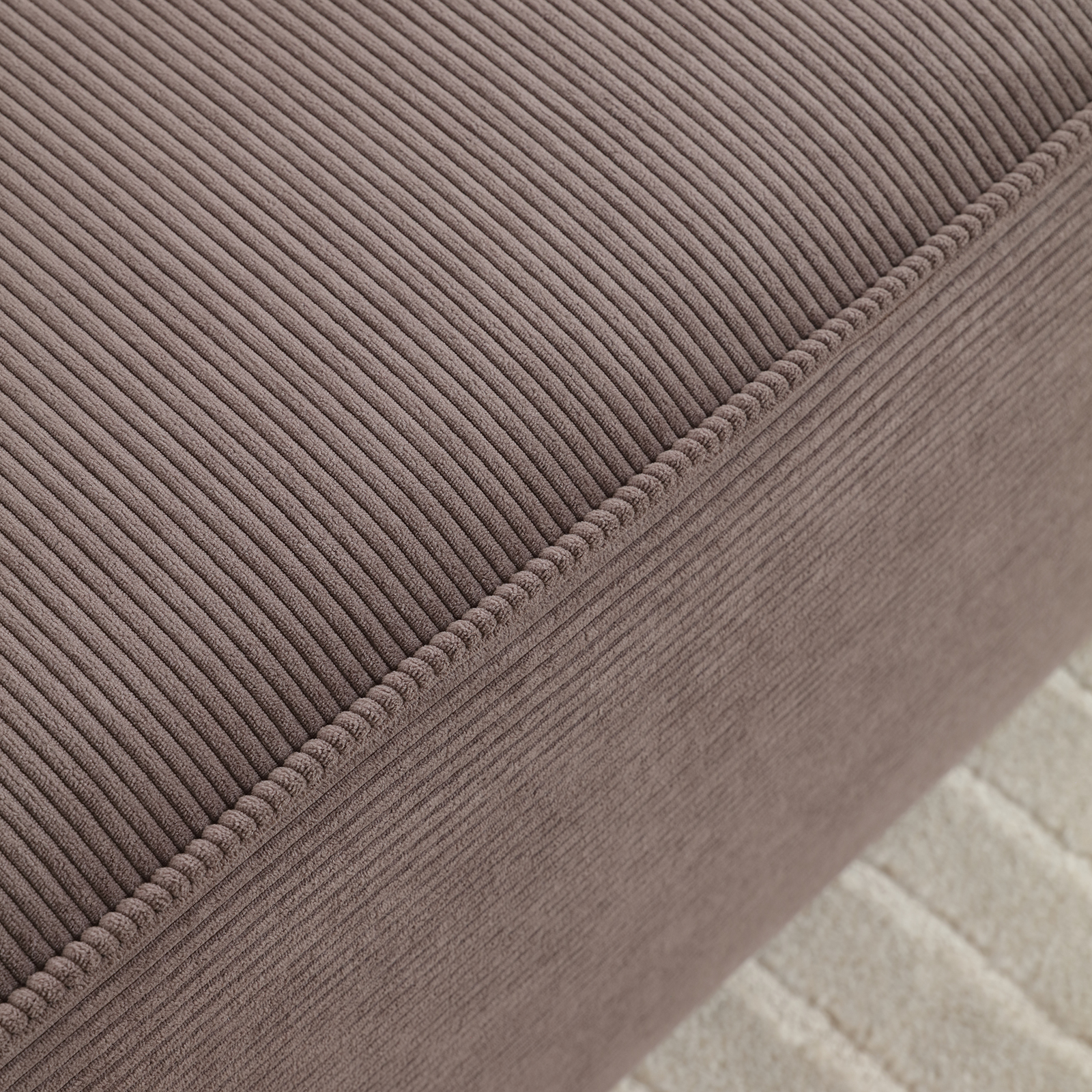 Button-tufted ottoman with elegant design