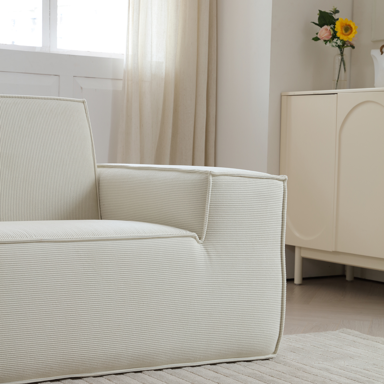 Modern room with white armchair and subtle lighting