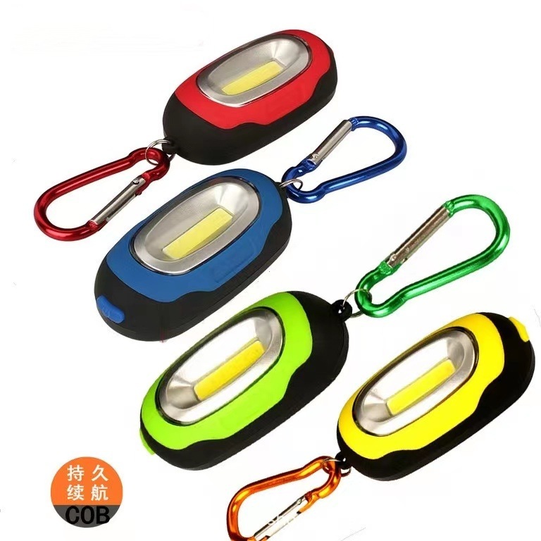 Luz LED COB portátil para acampar y aventuras al aire libre.