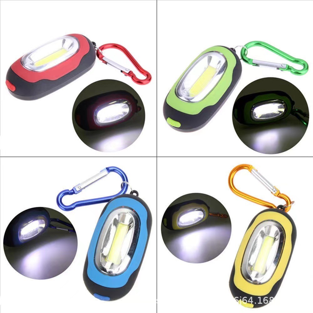 Luz LED COB portátil para acampar y aventuras al aire libre.
