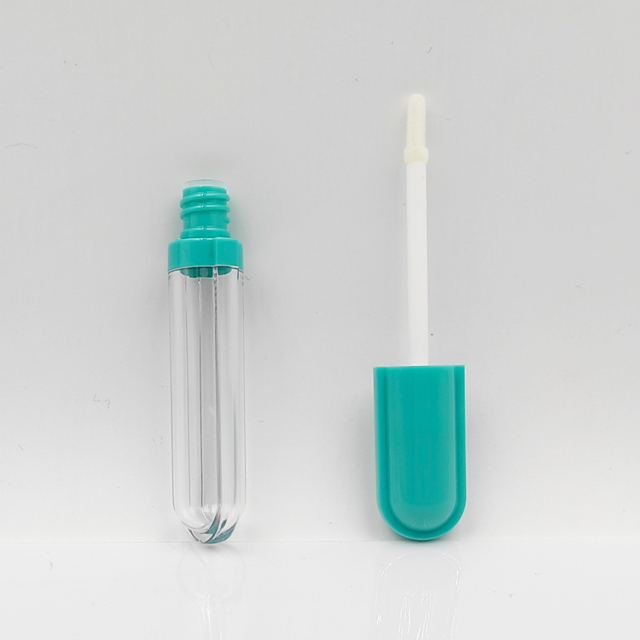 Newly capsule shape custom round bottle lip gloss 5ml plastic cosmetic container tube wholesale lip gloss empty lipstick tubes