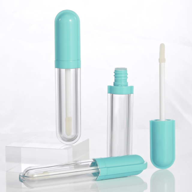 Newly capsule shape custom round bottle lip gloss 5ml plastic cosmetic container tube wholesale lip gloss empty lipstick tubes