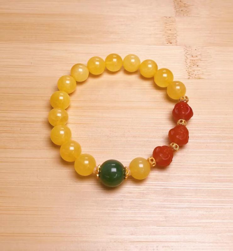 Natural Amber Bracelet with Natural Nanhong Buddha Head, Hetian Jade Round Beads, and 925 Silver Accents