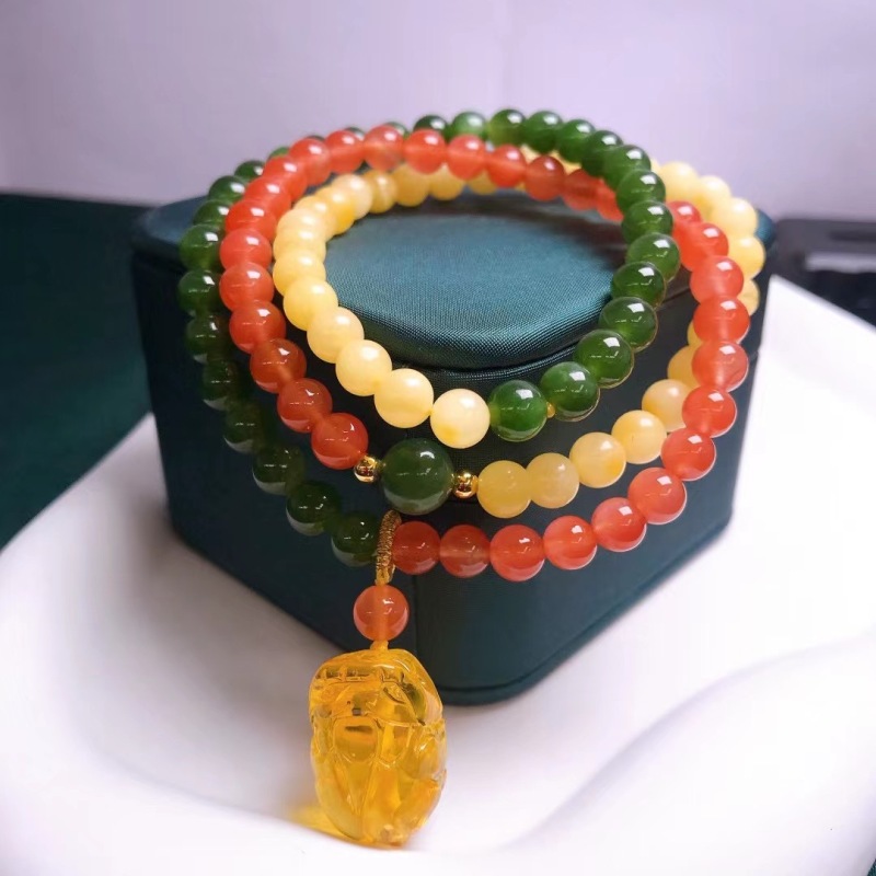 Natural Hetian Jade, Amber, and Nanhong Triple Strand Bracelet with Amber Pixiu Pendant