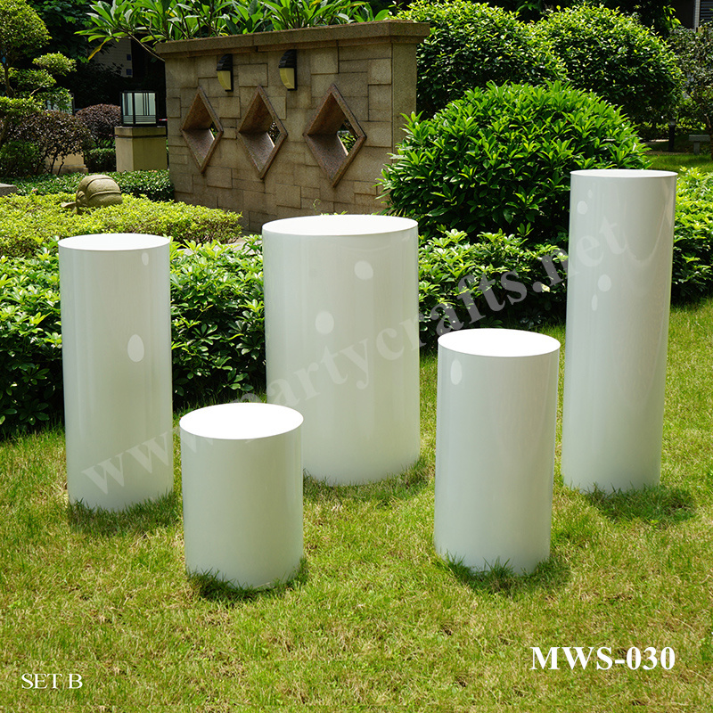white plinths stand