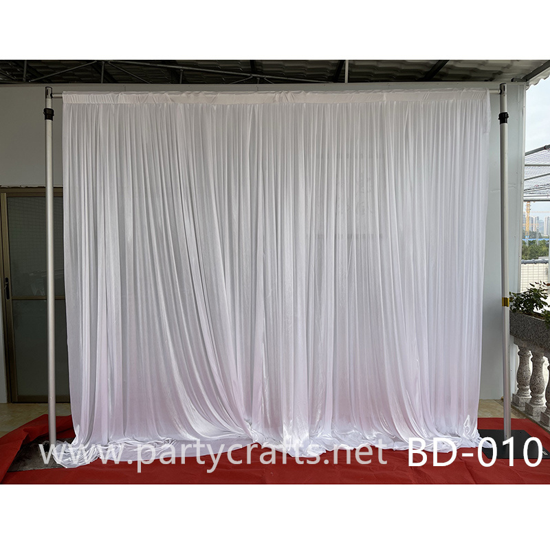 white fabric wedding stage backdrop
