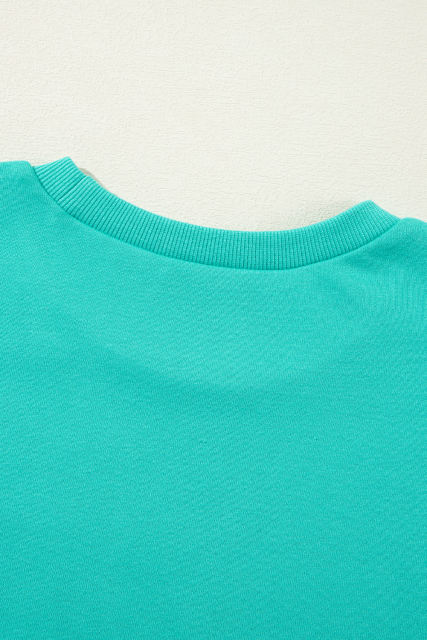 Aruba Blue Solid O Neck High Low Hem Pullover Sweatshirt