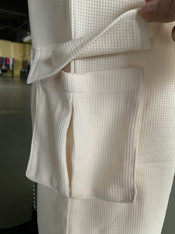 Apricot Solid Textured Sweatshirt and Multi Pockets Pant Set