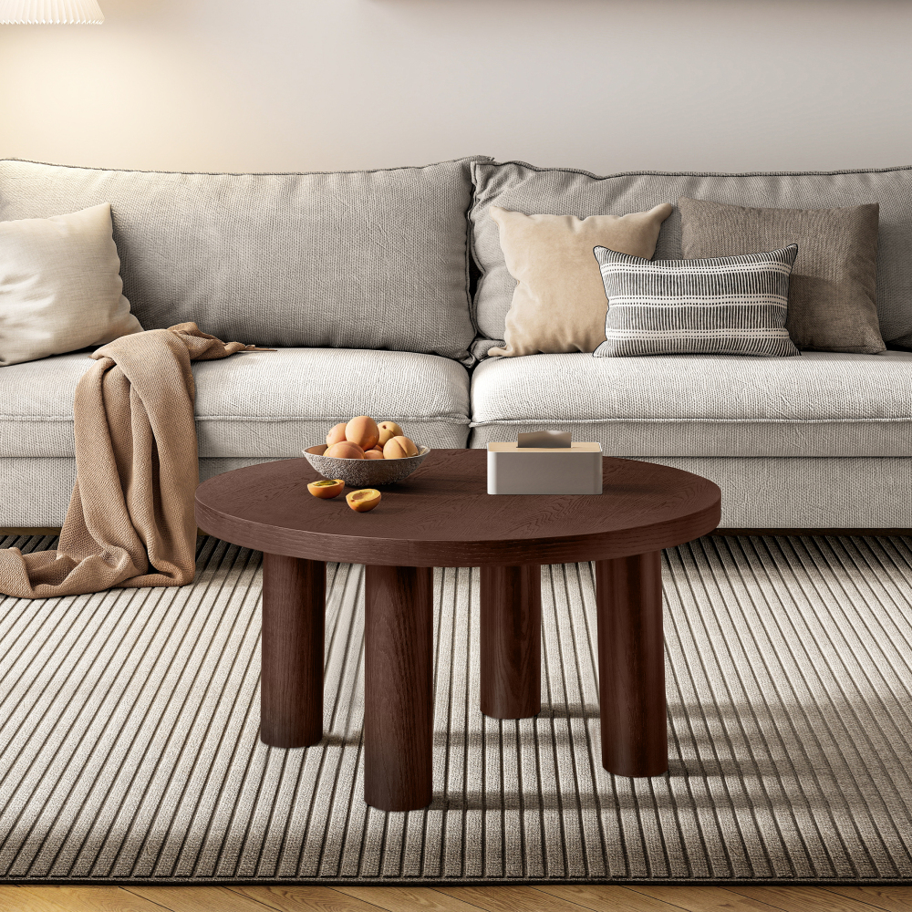 Modern Round Coffee Table with Solid Wood Legs – Stylish Centerpiece for Living Room with Neutral Tones and Elegant Floral Arrangement