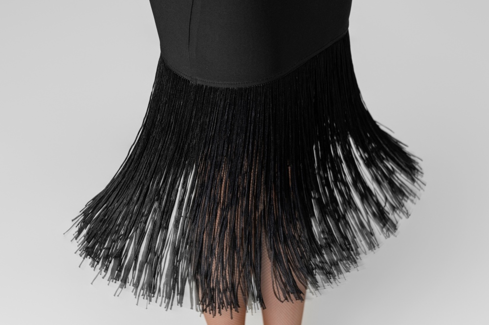 Slanted belt hanging tassels skirt