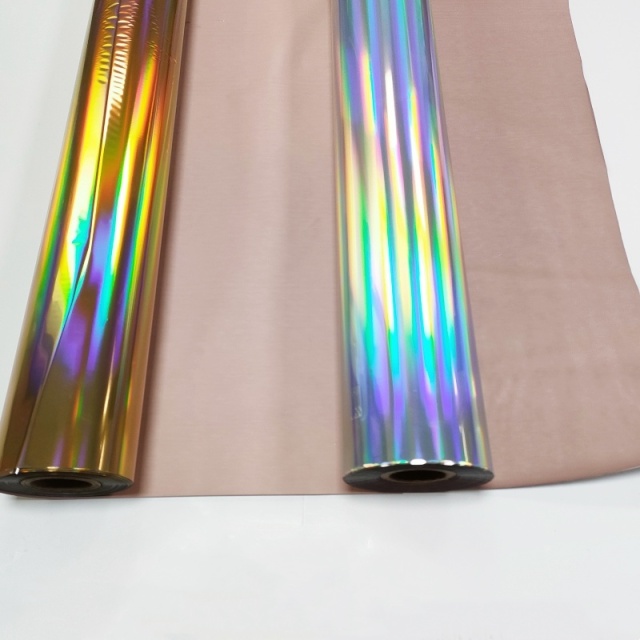 Stamped paper and leather holographic foils