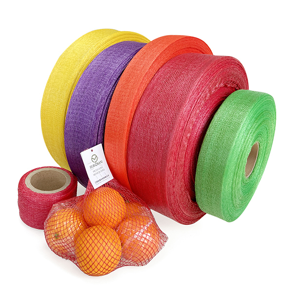 Colorful rolls of PE tubular knitted net, also known as fruit sleeve net, ready for use in automated packaging machines.