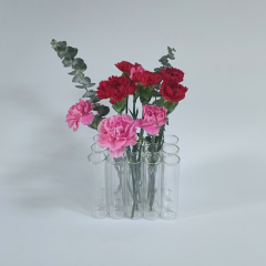 A set of 15 connected tube vases