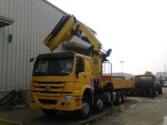 SINOTRUK HOWO 8×4 FOLDING TRUCK MOUNTED CRANE