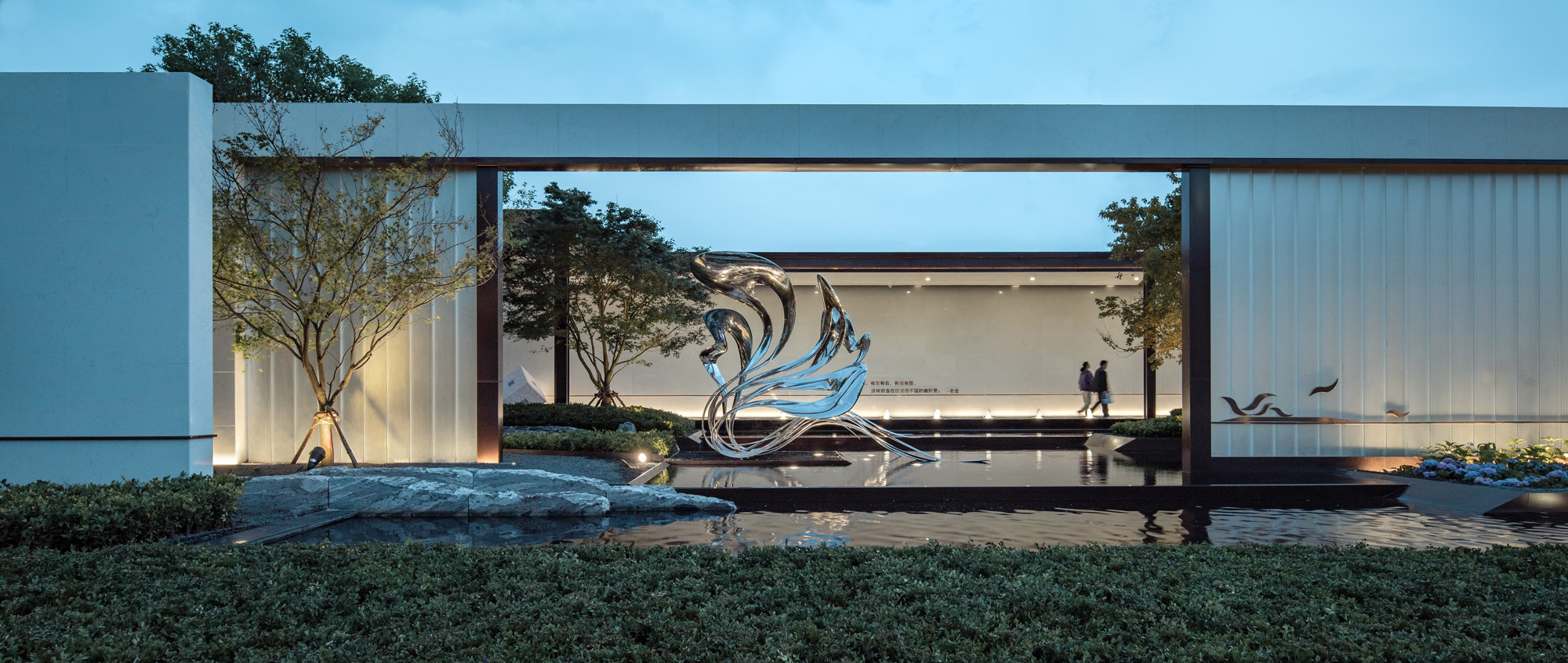 Elegant Polished Stainless Steel Abstract Waterscape Sculpture