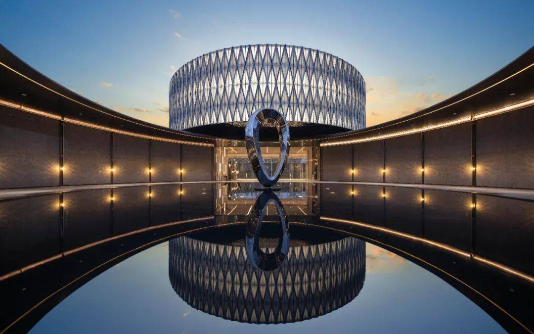 Modern Polished Stainless Steel Rotating Waterscape Art Sculpture
