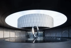 Modern Polished Stainless Steel Rotating Waterscape Art Sculpture