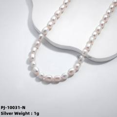 Artisan Beauty: Unique Silver Pearl Pendant Necklace